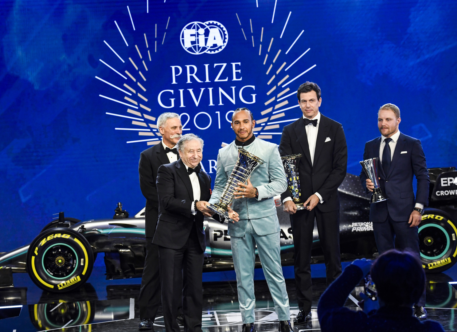 2019 FIA Prize Giving Gala: Toto Wolff, Lewis Hamilton and Valtteri Bottas receive their 2019 trophies (image courtest Mercedes-AMG Petronas)