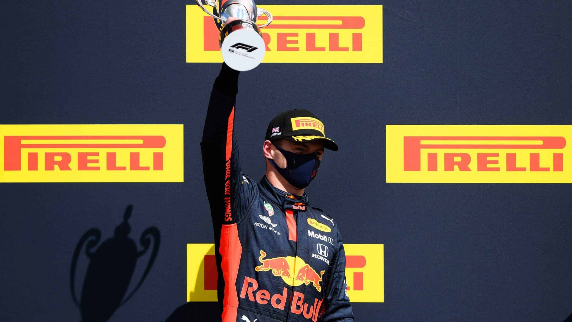 NORTHAMPTON, ENGLAND - AUGUST 02: Runner-up Max Verstappen of Netherlands and Red Bull Racing celebrates on the podium during the F1 Grand Prix of Great Britain at Silverstone on August 02, 2020 in Northampton, England. (Photo by Rudy Carezzevoli/Getty Images) // Getty Images / Red Bull Content Pool  // AP-24TQSN2T92111 // Usage for editorial use only //