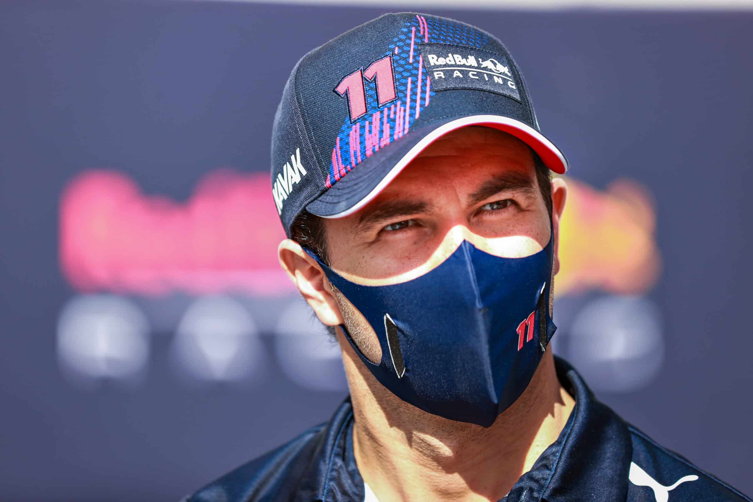 BAKU, AZERBAIJAN - JUNE 03: Sergio Perez of Mexico and Red Bull Racing looks on in the Paddock during previews ahead of the F1 Grand Prix of Azerbaijan at Baku City Circuit on June 03, 2021 in Baku, Azerbaijan. (Photo by Mark Thompson/Getty Images) // Getty Images / Red Bull Content Pool // SI202106030210 // Usage for editorial use only //