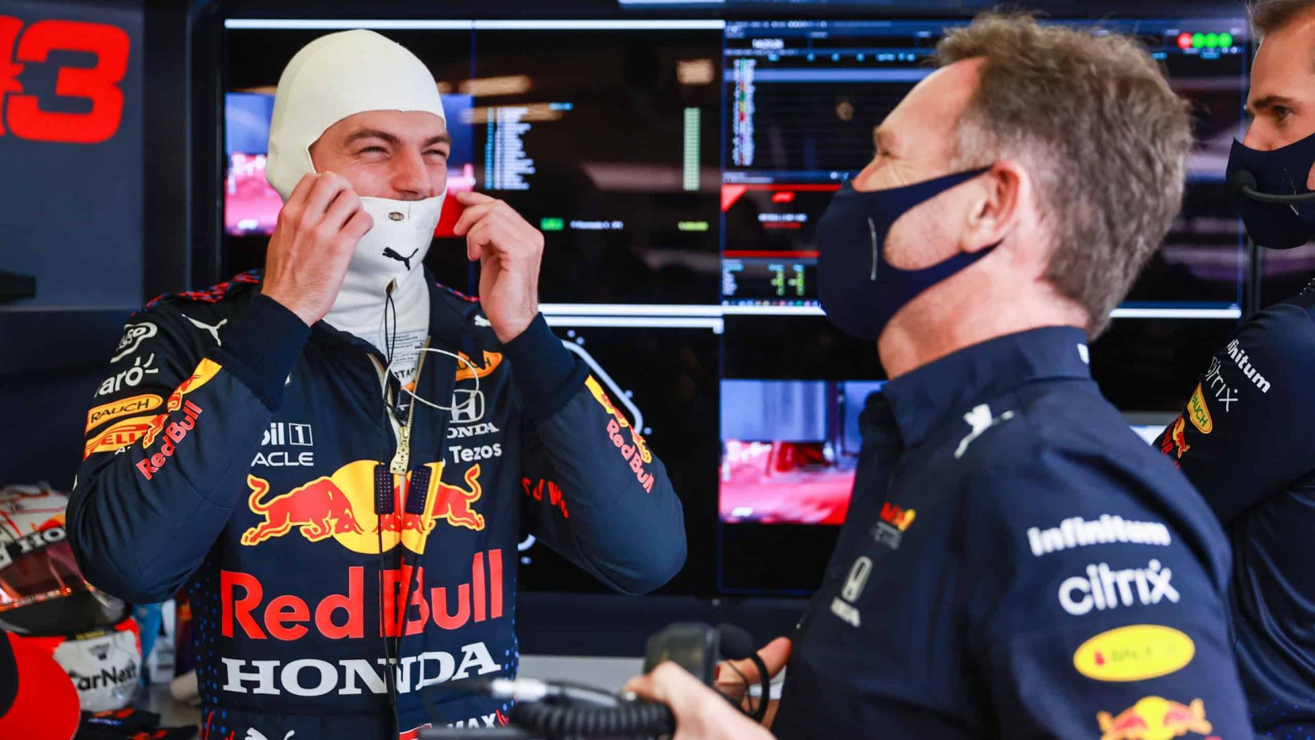 Max Verstappen of Netherlands and Red Bull Racing talks with Red Bull Racing Team Principal Christian Horner in the garage during practice ahead of the F1 Grand Prix of Great Britain at Silverstone on July 16, 2021 in Northampton, England. (image courtesy Red Bull Racing)