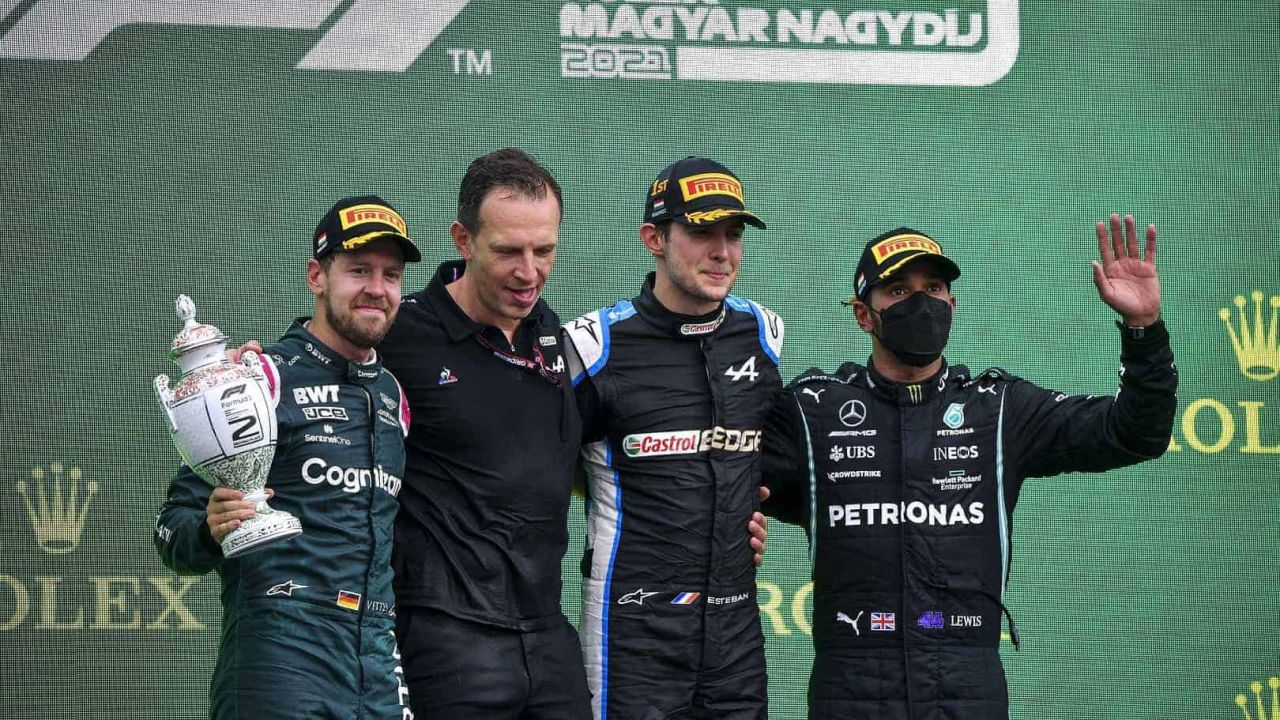 2021 Hungarian Grand Prix, Sunday - Sebastian Vettel, Esteban Ocon, and Lewis Hamilton on the podium (image courtesy Mercedes-AMG Petronas)