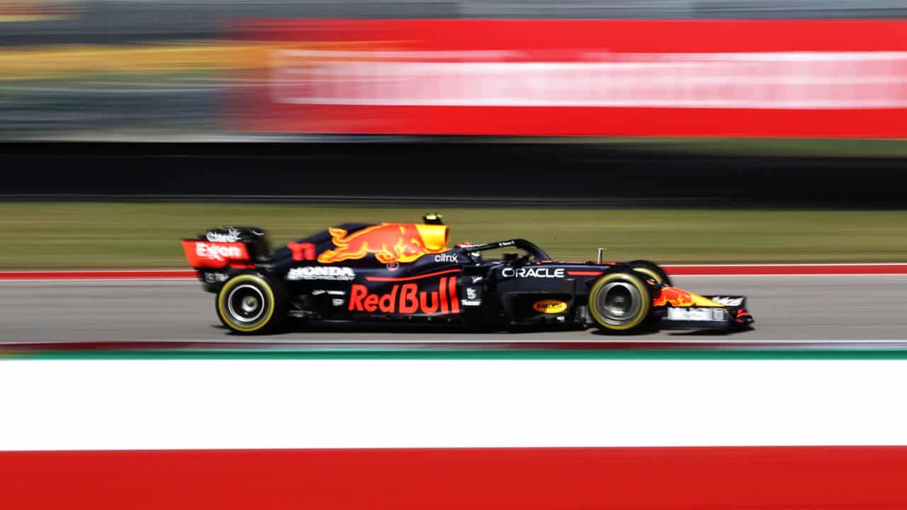 AUSTIN, TEXAS - OCTOBER 22: Sergio Perez of Mexico driving the (11) Red Bull Racing RB16B Honda of The Americas on October 22, 2021 in Austin, Texas. (Photo by Chris Graythen/Getty Images) // Getty Images / Red Bull Content Pool // SI202110221235 // Usage for editorial use only //