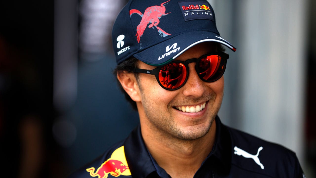 MIAMI, FLORIDA - MAY 06: Sergio Perez of Mexico and Oracle Red Bull Racing looks on in the Paddock prior to practice ahead of the F1 Grand Prix of Miami at the Miami International Autodrome on May 06, 2022 in Miami, Florida. (Photo by Chris Graythen/Getty Images) // Getty Images / Red Bull Content Pool // SI202205060206 // Usage for editorial use only //