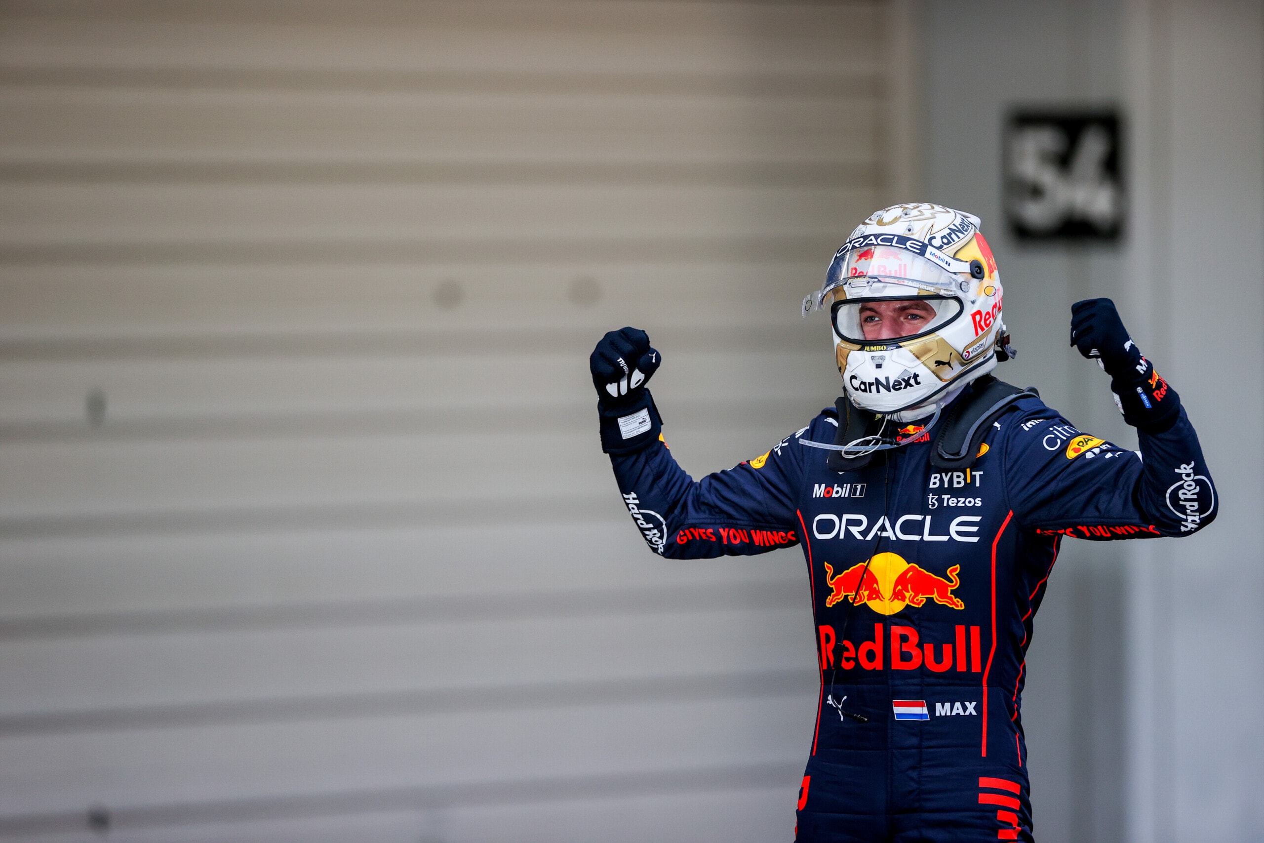 SUZUKA, JAPAN - OCTOBER 09: Max Verstappen of Red Bull Racing and The Netherlands celebrates finishing in first position and becoming the 2022 F1 Drivers World Champion during the F1 Grand Prix of Japan at Suzuka International Racing Course on October 09, 2022 in Suzuka, Japan. (Photo by Peter Fox/Getty Images) // Getty Images / Red Bull Content Pool // SI202210090405 // Usage for editorial use only //