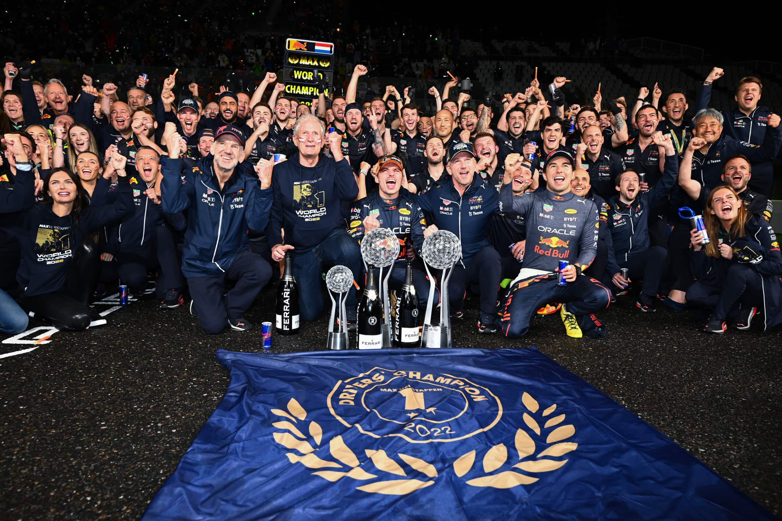 SUZUKA, JAPAN - OCTOBER 09: Race winner and 2022 F1 World Drivers Champion Max Verstappen of Netherlands and Oracle Red Bull Racing celebrates with his team after the F1 Grand Prix of Japan at Suzuka International Racing Course on October 09, 2022 in Suzuka, Japan. (Photo by Clive Mason/Getty Images) // Getty Images / Red Bull Content Pool // SI202210090532 // Usage for editorial use only //