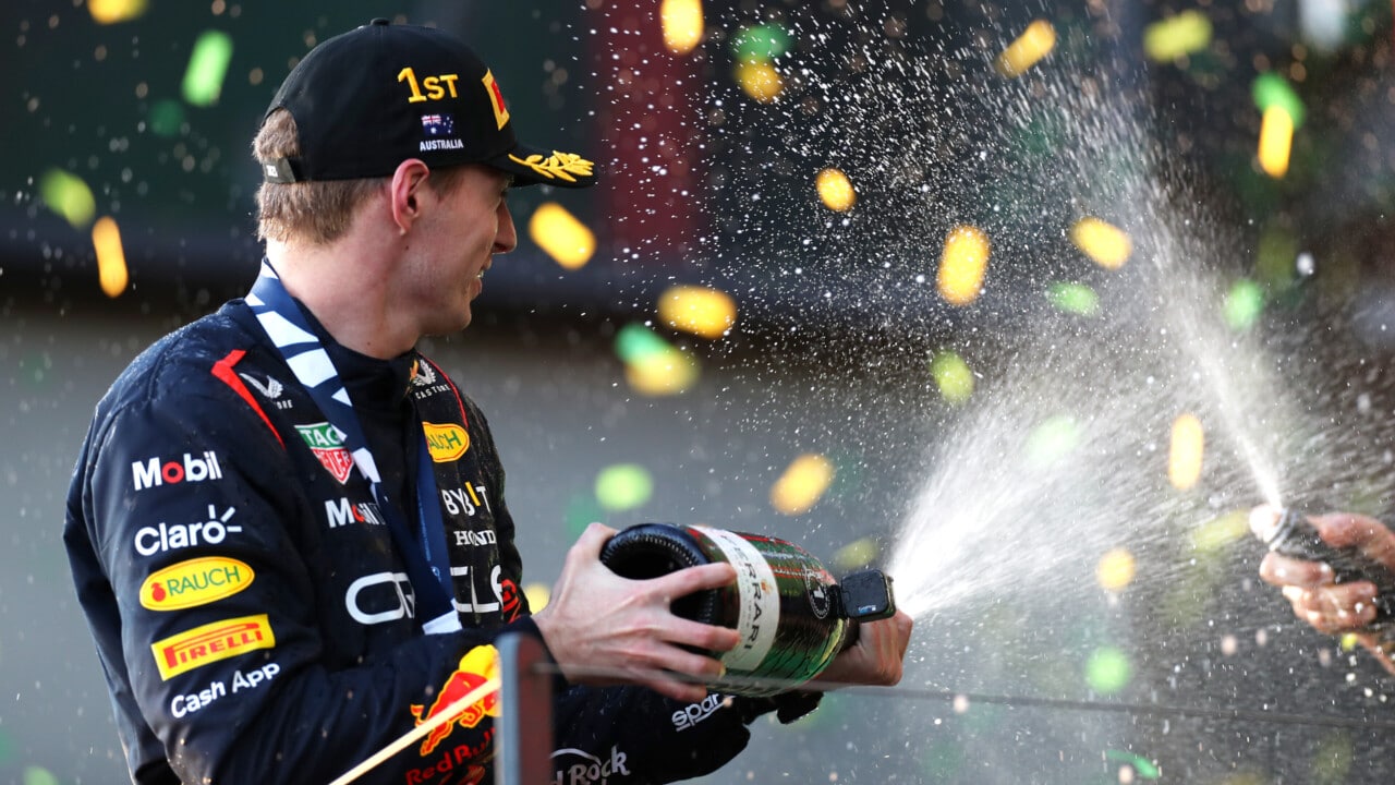 MELBOURNE, AUSTRALIA - APRIL 02: Race winner Max Verstappen of the Netherlands and Oracle Red Bull Racing celebrates on the podium during the F1 Grand Prix of Australia at Albert Park Grand Prix Circuit on April 02, 2023 in Melbourne, Australia. (Photo by Peter Fox/Getty Images) // Getty Images / Red Bull Content Pool // SI202304020233 // Usage for editorial use only //