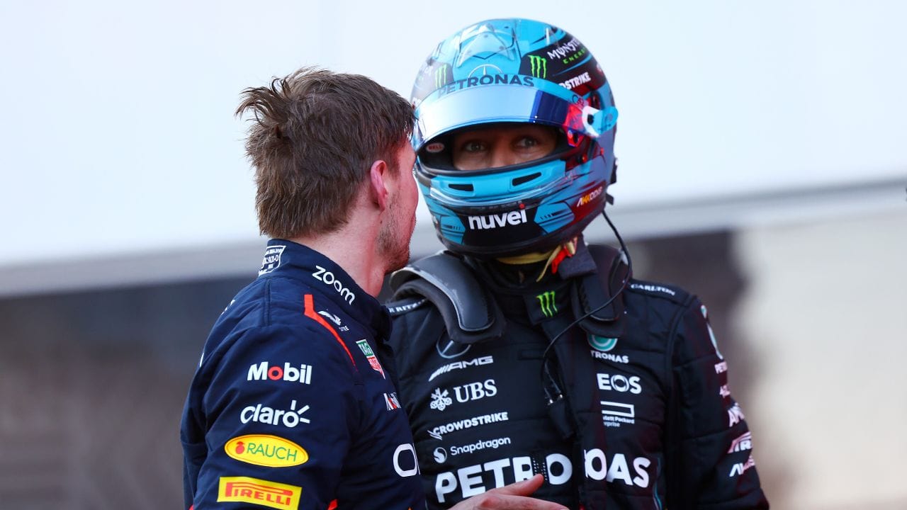 F1 Grand Prix Of Azerbaijan Sprint BAKU, AZERBAIJAN - APRIL 29: Third placed Max Verstappen of the Netherlands and Oracle Red Bull Racing and 4th placed George Russell of Great Britain and Mercedes talk in parc ferme during the Sprint ahead of the F1 Grand Prix of Azerbaijan at Baku City Circuit on April 29, 2023 in Baku, Azerbaijan. (Photo by Mark Thompson/Getty Images) // Getty Images / Red Bull Content Pool // SI202304291179 // Usage for editorial use only //