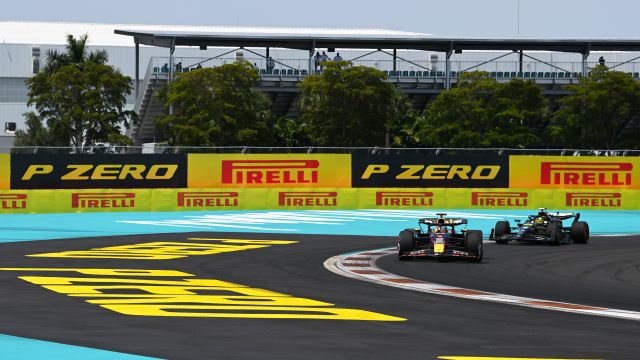 Max Verstappen, Red Bull Racing RB19, leads Sir Lewis Hamilton, Mercedes F1 W14 during the Miami GP at Miami International Autodrome