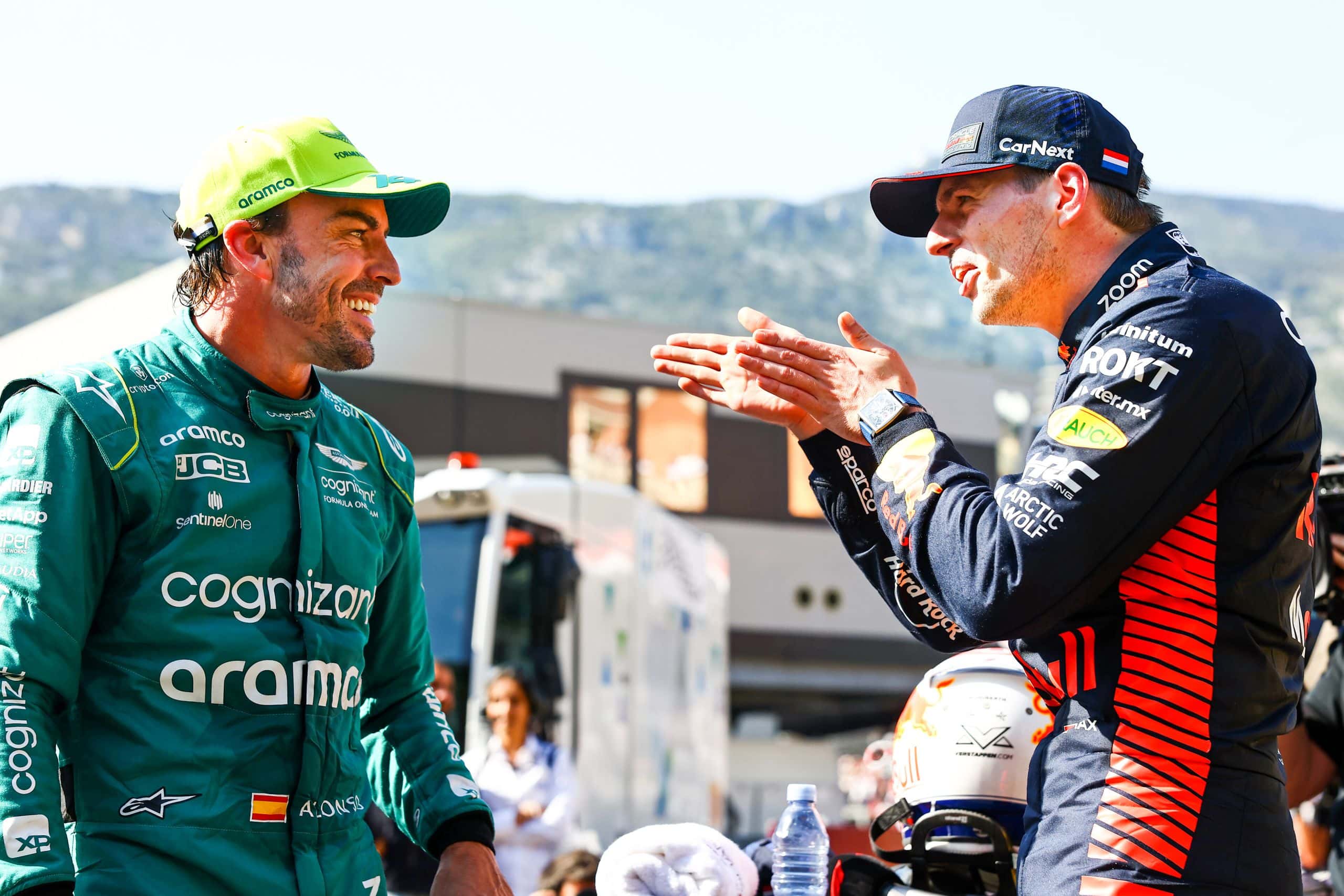 MONTE-CARLO, MONACO - MAY 27: Pole position qualifier Max Verstappen of the Netherlands and Oracle Red Bull Racing and Second placed qualifier Fernando Alonso of Spain and Aston Martin F1 Team talk in parc ferme during qualifying ahead of the F1 Grand Prix of Monaco at Circuit de Monaco on May 27, 2023 in Monte-Carlo, Monaco. (Photo by Mark Thompson/Getty Images) // Getty Images / Red Bull Content Pool // SI202305270377 // Usage for editorial use only //
