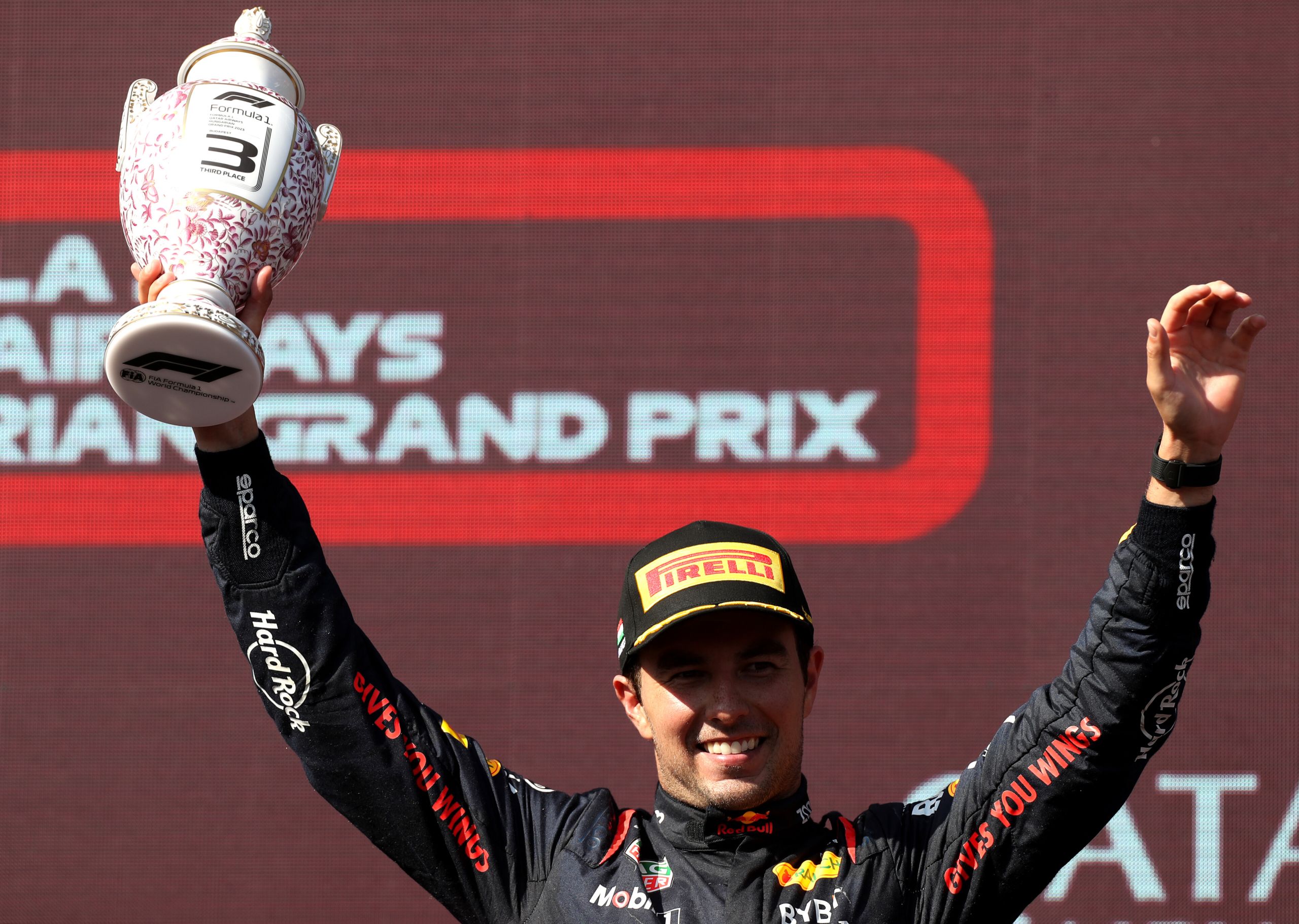 BUDAPEST, HUNGARY - JULY 23: Third placed Sergio Perez of Mexico and Oracle Red Bull Racing celebrates on the podium during the F1 Grand Prix of Hungary at Hungaroring on July 23, 2023 in Budapest, Hungary. (Photo by Peter Fox/Getty Images) // Getty Images / Red Bull Content Pool // SI202307230691 // Usage for editorial use only //
