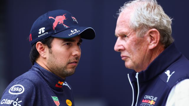 SPIELBERG, AUSTRIA - JULY 09: Sergio Perez of Mexico and Oracle Red Bull Racing talks with Red Bull Racing Team Consultant Dr Helmut Marko during practice ahead of the F1 Grand Prix of Austria at Red Bull Ring on July 09, 2022 in Spielberg, Austria. (Photo by Clive Rose/Getty Images) // Getty Images / Red Bull Content Pool // SI202207090203 // Usage for editorial use only //