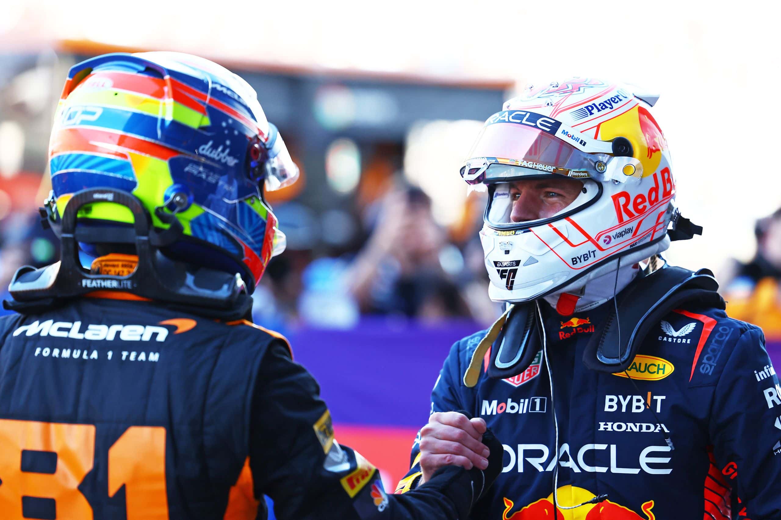 SUZUKA, JAPAN - SEPTEMBER 23: Pole position qualifier Max Verstappen of the Netherlands and Oracle Red Bull Racing and Second placed qualifier Oscar Piastri of Australia and McLaren celebrates in parc ferme during qualifying ahead of the F1 Grand Prix of Japan at Suzuka International Racing Course on September 23, 2023 in Suzuka, Japan. (Photo by Mark Thompson/Getty Images) // Getty Images / Red Bull Content Pool // SI202309230176 // Usage for editorial use only //