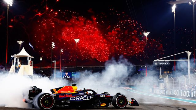 ABU DHABI, UNITED ARAB EMIRATES - NOVEMBER 26: Race winner Max Verstappen of the Netherlands driving the (1) Oracle Red Bull Racing RB19 performs donuts on track during the F1 Grand Prix of Abu Dhabi at Yas Marina Circuit on November 26, 2023 in Abu Dhabi, United Arab Emirates. (Photo by Mark Thompson/Getty Images) // Getty Images / Red Bull Content Pool // SI202311260253 // Usage for editorial use only //
