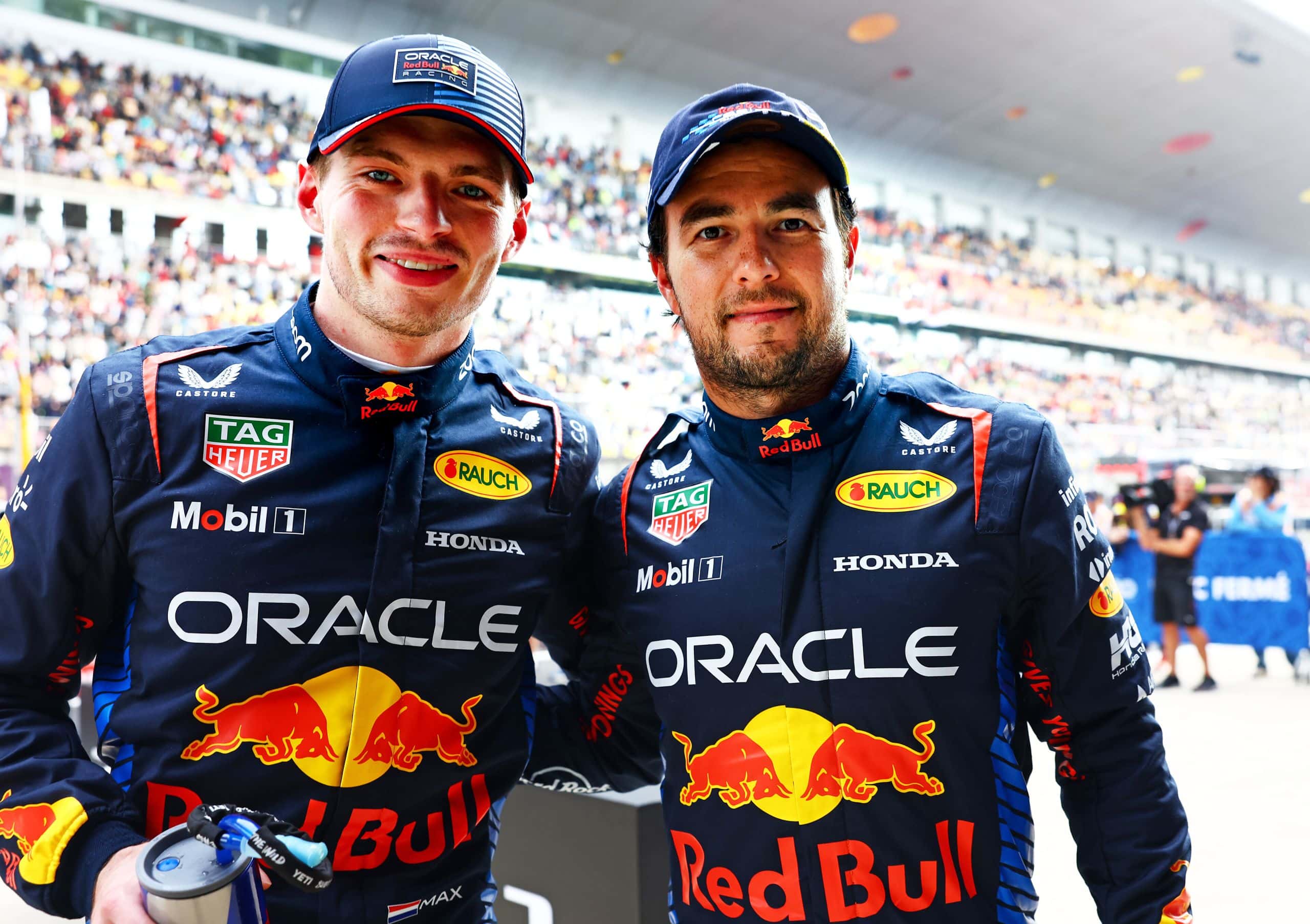 SHANGHAI, CHINA - APRIL 20: Pole position qualifier Max Verstappen of the Netherlands and Oracle Red Bull Racing and Second placed qualifier Sergio Perez of Mexico and Oracle Red Bull Racing celebrate in parc ferme after qualifying ahead of the F1 Grand Prix of China at Shanghai International Circuit on April 20, 2024 in Shanghai, China. (Photo by Mark Thompson/Getty Images) // Getty Images / Red Bull Content Pool // SI202404200271 // Usage for editorial use only //