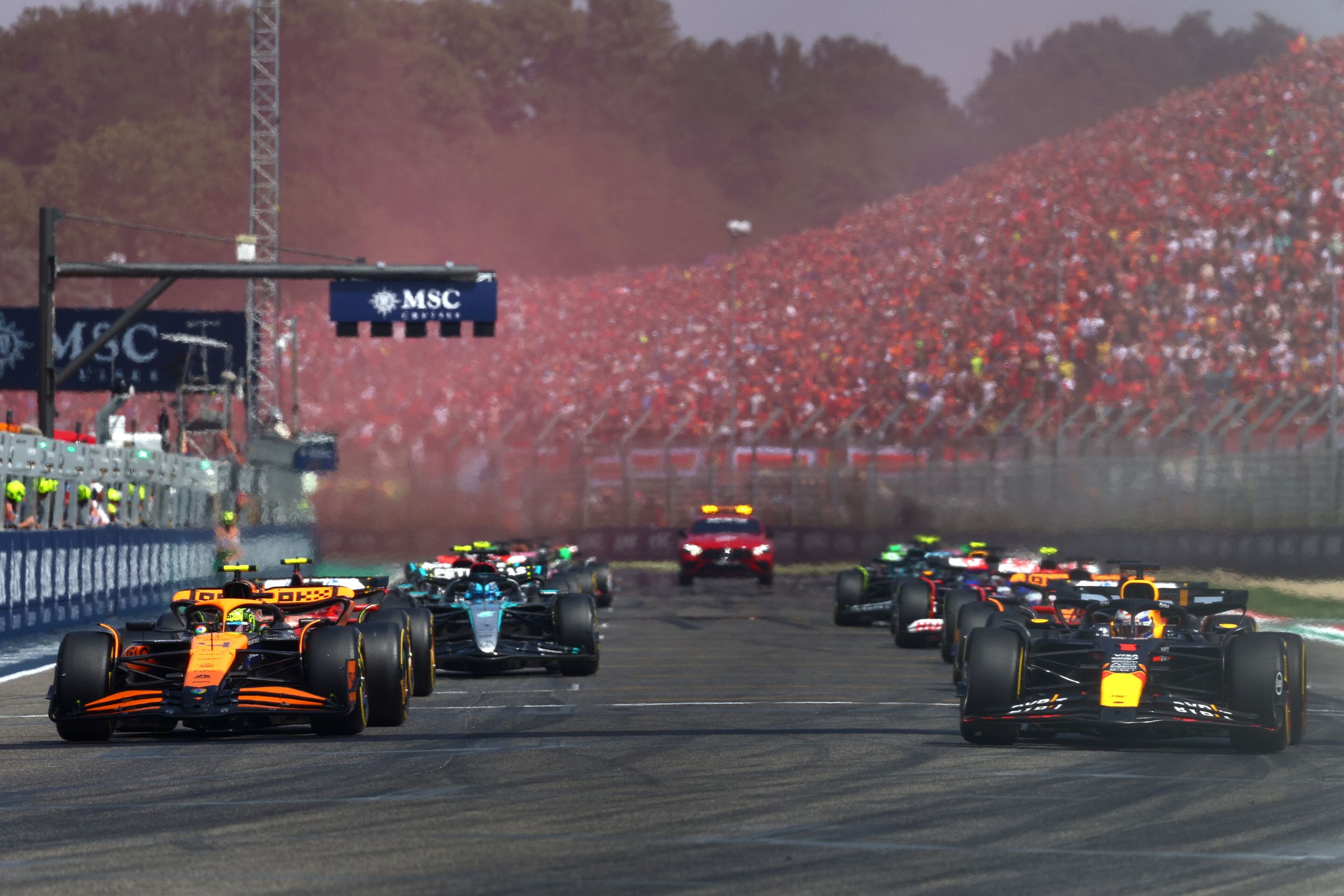 IMOLA, ITALY - MAY 19: Max Verstappen of the Netherlands driving the (1) Oracle Red Bull Racing RB20 leads the field off the line at the start during the F1 Grand Prix of Emilia-Romagna at Autodromo Enzo e Dino Ferrari Circuit on May 19, 2024 in Imola, Italy. (Photo by Clive Rose/Getty Images) // Getty Images / Red Bull Content Pool // SI202405190603 // Usage for editorial use only //