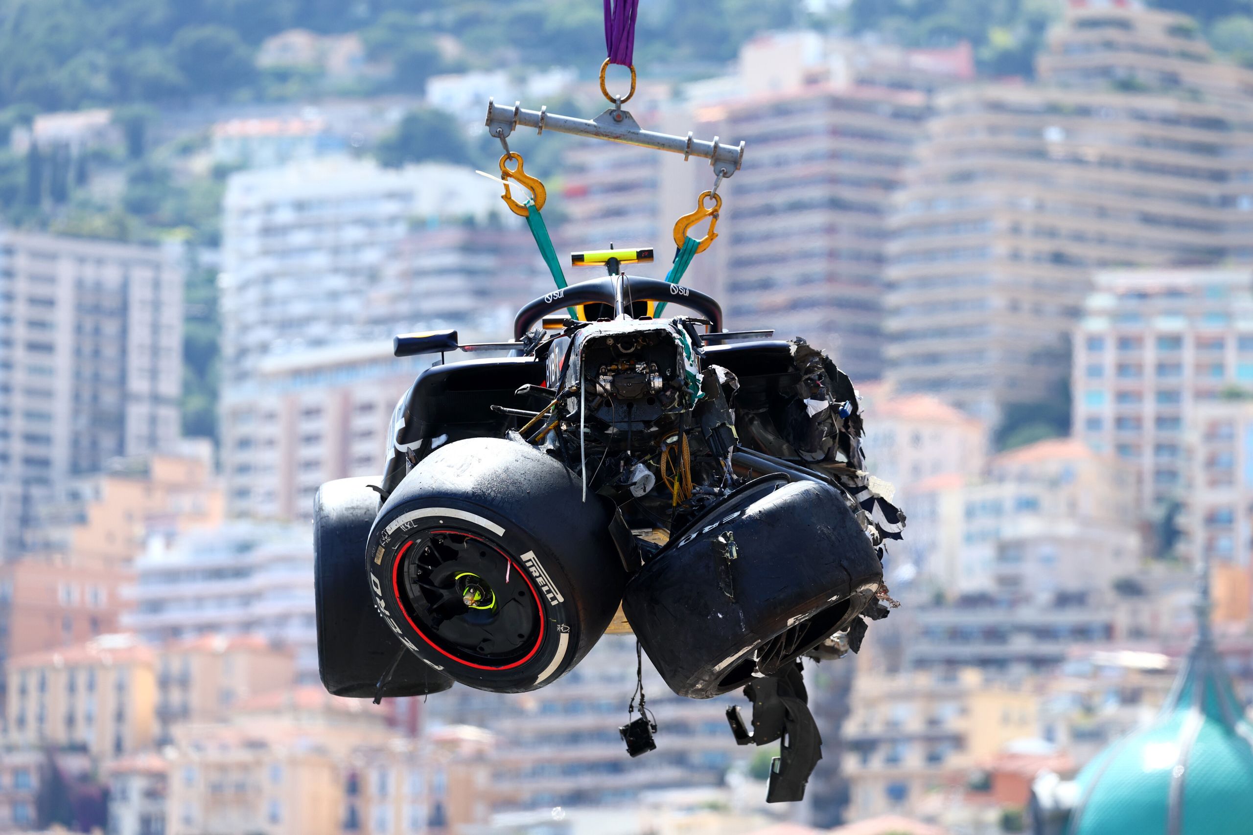 MONTE-CARLO, MONACO - MAY 26: The car of Sergio Perez of Mexico and Oracle Red Bull Racing is recovered from the track after crashing during the F1 Grand Prix of Monaco at Circuit de Monaco on May 26, 2024 in Monte-Carlo, Monaco. (Photo by Clive Rose/Getty Images) *** BESTPIX *** // Getty Images / Red Bull Content Pool // SI202405260966 // Usage for editorial use only //