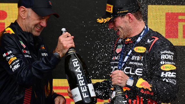 MONTREAL, QUEBEC - JUNE 18: Adrian Newey, the Chief Technical Officer of Red Bull Racing and First placed Max Verstappen of the Netherlands and Oracle Red Bull Racing celebrate on the podium during the F1 Grand Prix of Canada at Circuit Gilles Villeneuve on June 18, 2023 in Montreal, Quebec. (Photo by Clive Mason/Getty Images) // Getty Images / Red Bull Content Pool // SI202306181180 // Usage for editorial use only //