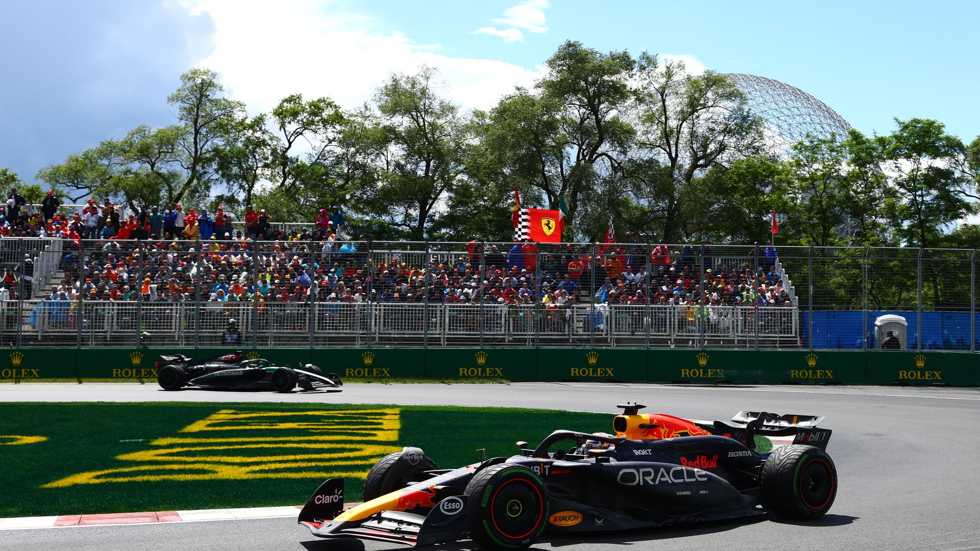 MONTREAL, QUEBEC - JUNE 09: Max Verstappen of the Netherlands driving the (1) Oracle Red Bull Racing RB20 leads George Russell of Great Britain driving the (63) Mercedes AMG Petronas F1 Team W15 on track during the F1 Grand Prix of Canada at Circuit Gilles Villeneuve on June 09, 2024 in Montreal, Quebec. (Photo by Clive Rose/Getty Images) // Getty Images / Red Bull Content Pool // SI202406091153 // Usage for editorial use only //