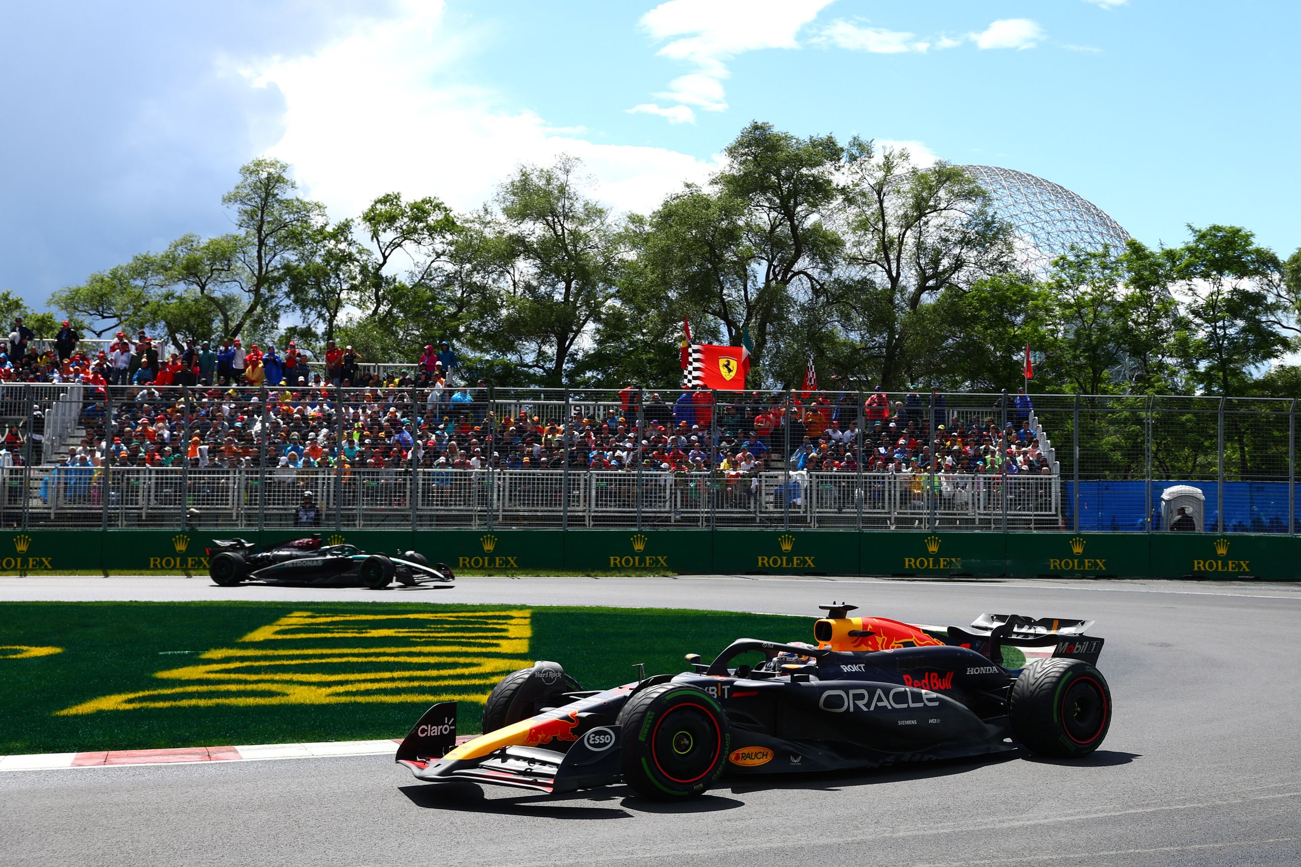 MONTREAL, QUEBEC - JUNE 09: Max Verstappen of the Netherlands driving the (1) Oracle Red Bull Racing RB20 leads George Russell of Great Britain driving the (63) Mercedes AMG Petronas F1 Team W15 on track during the F1 Grand Prix of Canada at Circuit Gilles Villeneuve on June 09, 2024 in Montreal, Quebec. (Photo by Clive Rose/Getty Images) // Getty Images / Red Bull Content Pool // SI202406091153 // Usage for editorial use only //