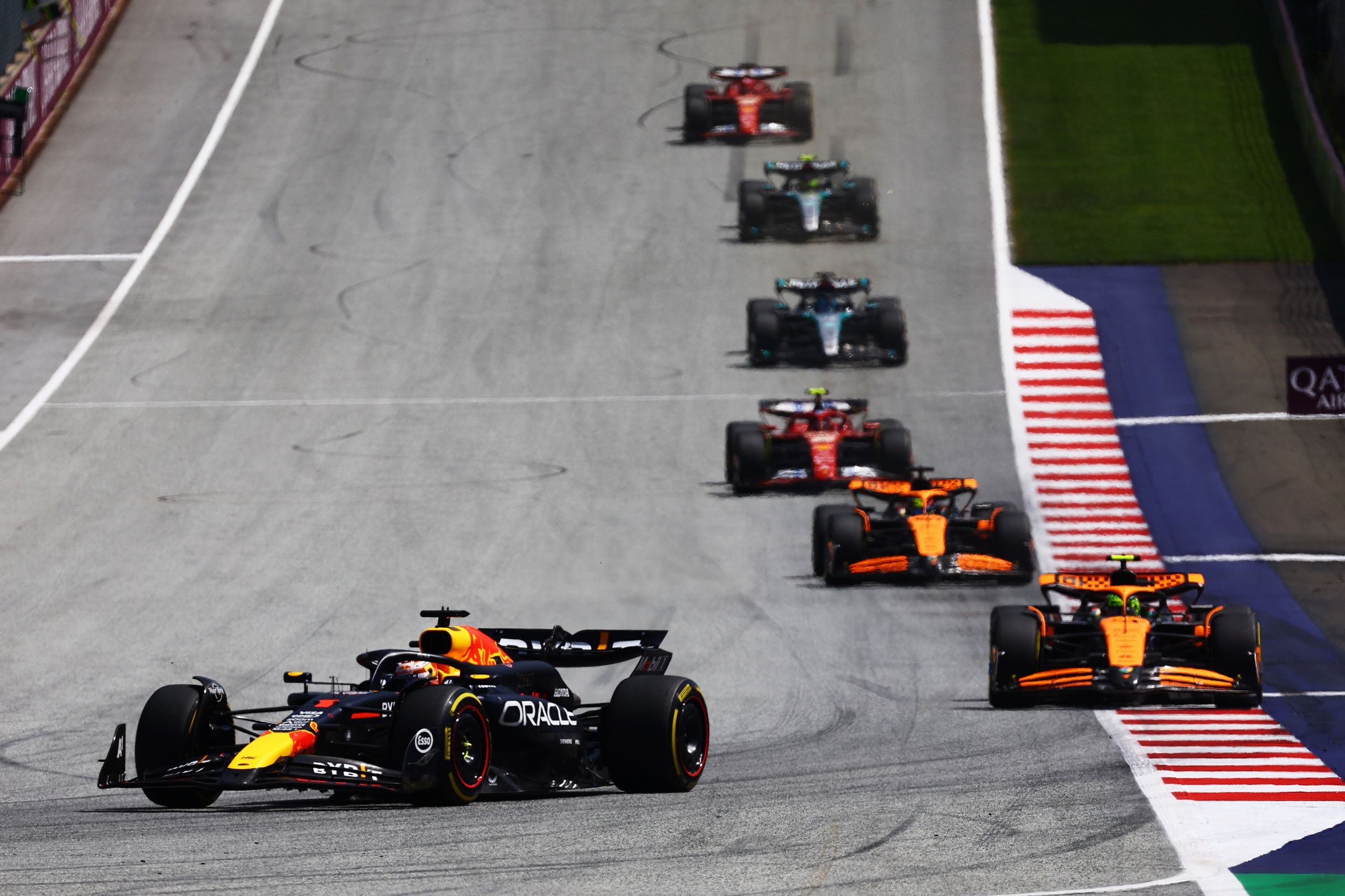 SPIELBERG, AUSTRIA - JUNE 29: Max Verstappen of the Netherlands driving the (1) Oracle Red Bull Racing RB20 leads Lando Norris of Great Britain driving the (4) McLaren MCL38 Mercedes during the Sprint ahead of the F1 Grand Prix of Austria at Red Bull Ring on June 29, 2024 in Spielberg, Austria. (Photo by Mark Thompson/Getty Images). // Getty Images / Red Bull Content Pool // SI202406290097 // Usage for editorial use only //