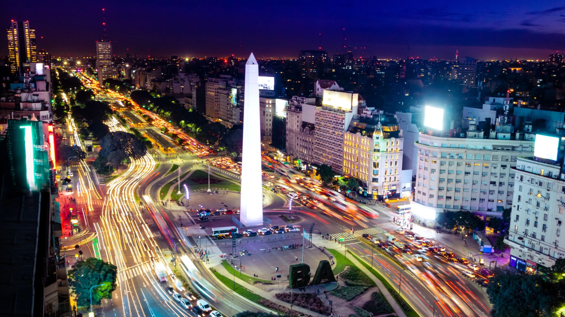 Colorful Aerial view of Buenos Aires and 9 de julio avenue at night - Buenos Aires, Argentina (Photo by diegograndi/Deposit Photos)