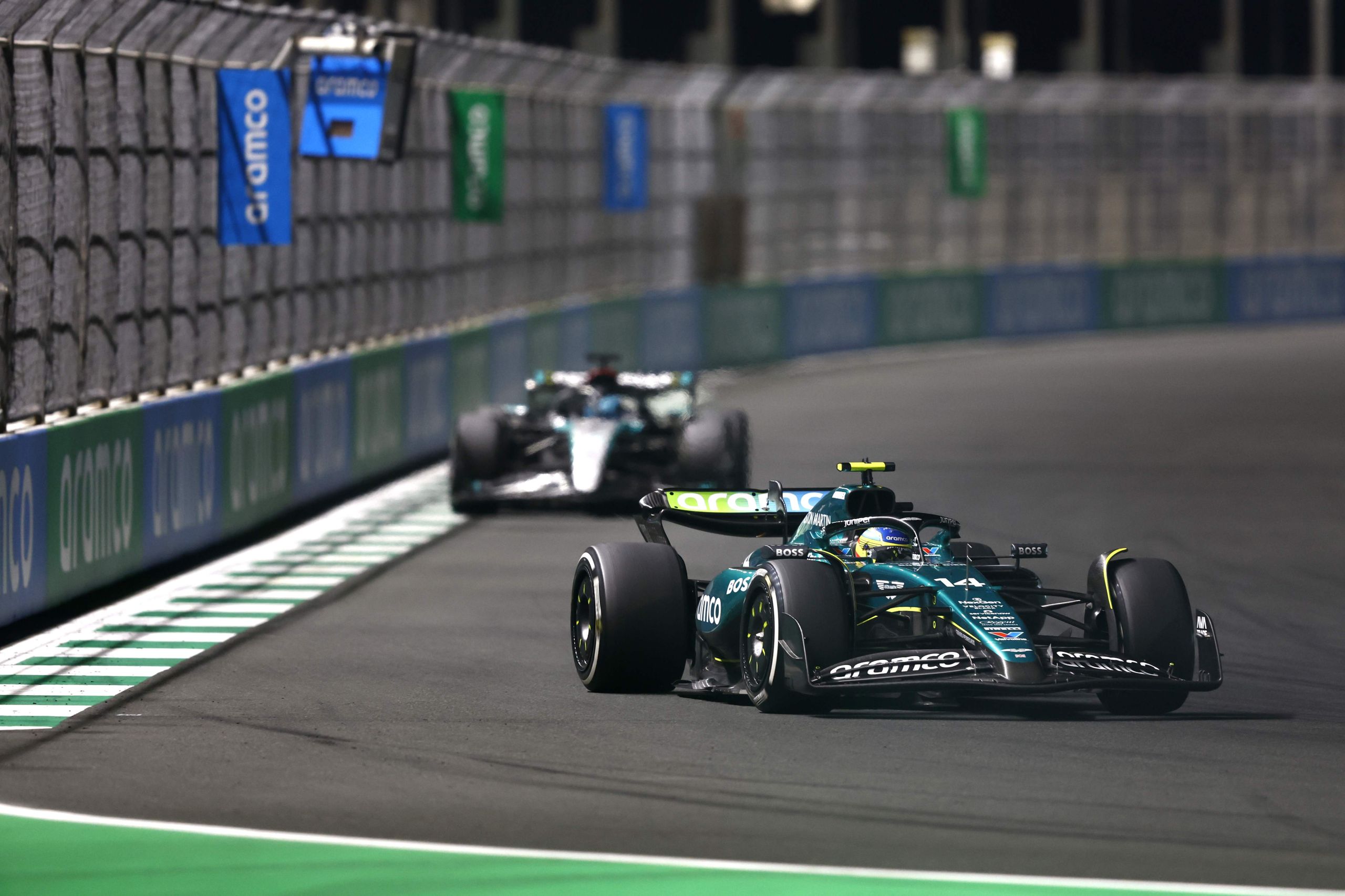 Fernando Alonso, Aston Martin Amr24, Leads George Russell, Mercedes F1 W15