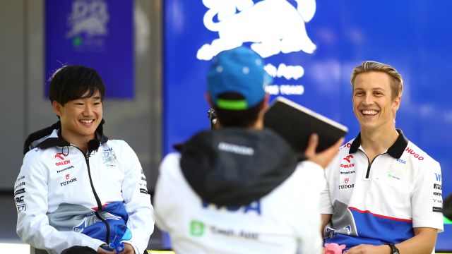 MELBOURNE, AUSTRALIA - MARCH 21: Yuki Tsunoda of Japan and Visa Cash App RB, Daniel Ricciardo of Australia and Visa Cash App RB and Liam Lawson of New Zealand and Visa Cash App RB talk in the Paddock during previews ahead of the F1 Grand Prix of Australia at Albert Park Circuit on March 21, 2024 in Melbourne, Australia. (Photo by Peter Fox/Getty Images)