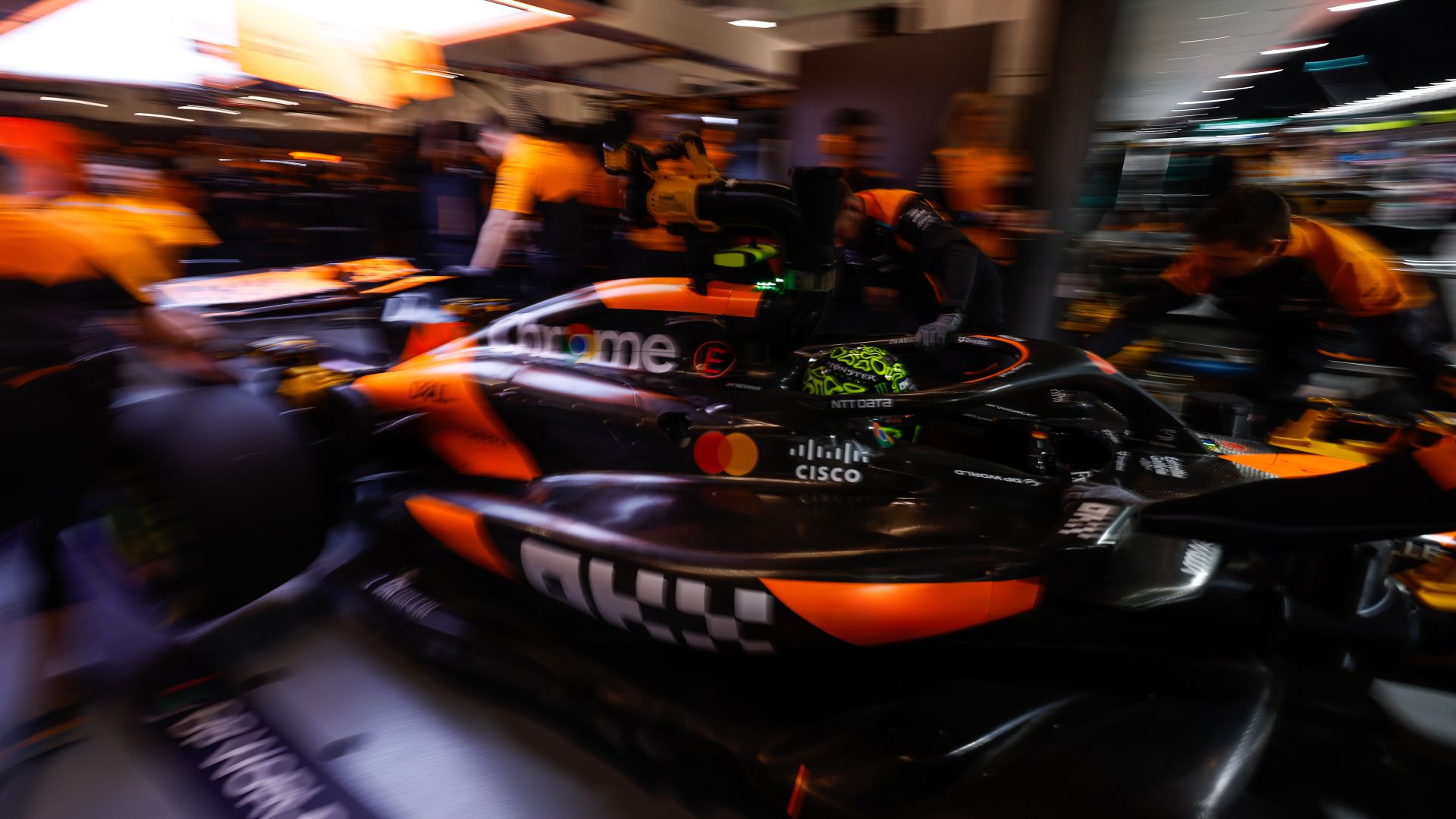 Lando Norris, Mclaren Mcl38, Is Returned To The Garage