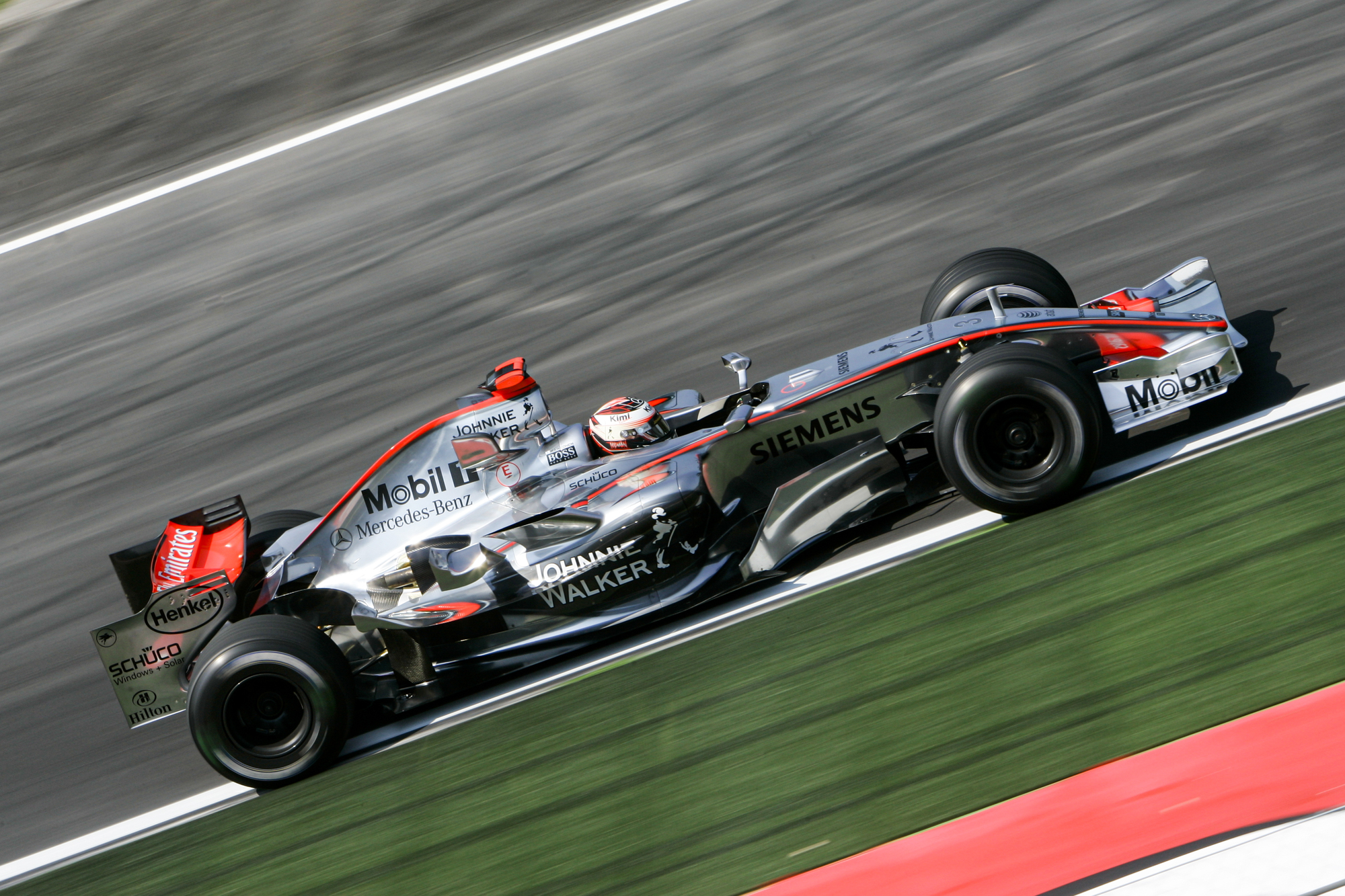 Position 9 - Kimi Raikkonen (87 race starts) Kimi Raikkonen, the Finnish "Iceman," raced for McLaren from 2002 to 2006, accumulating 87 starts and establishing himself as a formidable talent during a highly competitive era of Formula 1. Joining from Sauber, he quickly adapted, securing his first career victory at the 2003 Malaysian Grand Prix and finishing runner-up in the Drivers' Championship that year, just two points shy of Michael Schumacher, despite McLaren’s car often lacking the pace of Ferrari. Raikkonen’s tenure included nine wins and 28 podiums, showcasing his speed and cool-headedness, though reliability issues—such as engine failures in 2006—often hampered his title chances. His standout 2005 season saw seven wins, yet he finished second again due to mechanical setbacks, before departing for Ferrari in 2007, leaving McLaren with a legacy of raw talent and a near-miss at the championship. Image via CristianoBarni/Deposit Photos