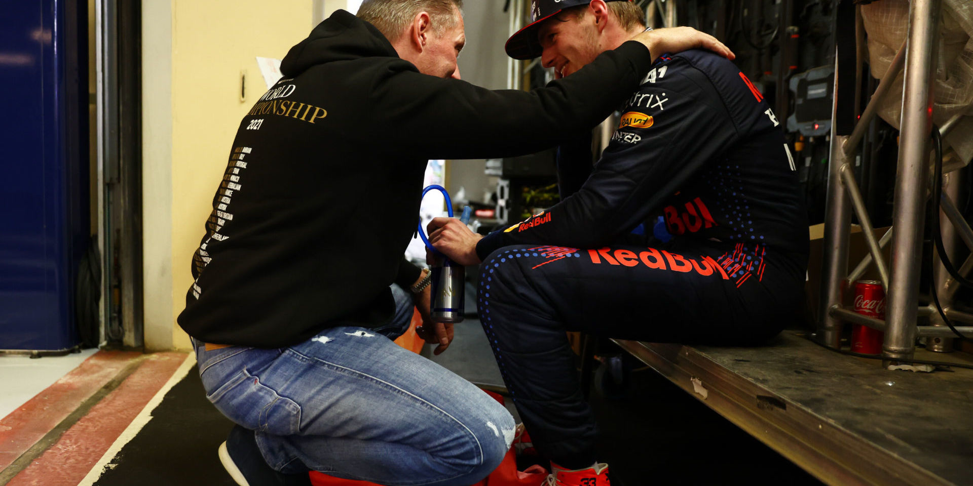 ABU DHABI, UNITED ARAB EMIRATES - DECEMBER 12: Race winner and 2021 F1 World Drivers Champion Max Verstappen of Netherlands and Red Bull Racing celebrates with his father Jos Verstappen in parc ferme during the F1 Grand Prix of Abu Dhabi at Yas Marina Circuit on December 12, 2021 in Abu Dhabi, United Arab Emirates. (Photo by Mark Thompson/Getty Images) // Getty Images / Red Bull Content Pool // SI202112120386 // Usage for editorial use only //